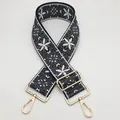 Bandoulière brodée style ethnique noir et blanc avec crochets pivotants dorés - Taille 10
