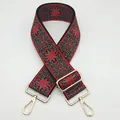 Bandoulière large brodée rouge et noire réglable avec mousquetons en métal doré - Taille 9