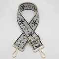 Bandoulière large brodée de fleurs noires avec crochets en métal doré brillant - Taille 17