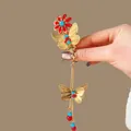 Elegant gold Chinese style butterfly hair clip with vibrant red flower and long tassels - F1584 Red & Blue Flower Butterfly