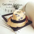 Kids' beige straw fedora with blue palm tree patterns and black ribbon accent - Khaki