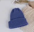Detailed knit texture of children's navy puppy beanie with ribbed cuff and warm material - Sapphire Blue
