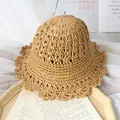 Handwoven khaki straw hat for girls featuring wavy hollowed lace brim and dome design - Khaki