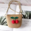 Handmade straw crossbody bag for girls featuring 3D red cherry crochet ornaments - Khaki