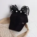 Girls black baseball cap featuring lace bow with pearls and metal M letter logo - One Size / Black