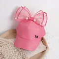 Pink girl's baseball cap featuring a large lace bow, imitation pearls, and metal M logo - One Size / Rose Pink