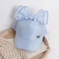 Light blue girls baseball cap with large lace bow, pearls and silver M letter detail - One Size / Blue