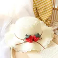 Beige woven straw sun hat for children with strawberry charms and white lace trim - One Size / Milk White Straw Hat