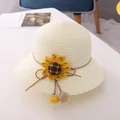 Girls cream straw sun hat featuring a yellow sunflower and playful plush pom-poms - Single Hat / Milk White Straw Hat
