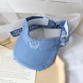Kids light blue open top sun hat with embroidered smiley face and frayed brim - One Size / Blue