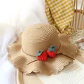 Kids' straw sun hat with cute red strawberry pendants and wavy brim design - One Size / Khaki Hat
