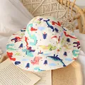 Beige cotton kids sun hat featuring colorful cartoon dinosaur prints and a wide brim - 48cm / White Dinosaur