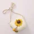 Beige woven straw shoulder bag for girls with yellow sunflower applique and colorful pom-poms - Off-white Bag