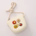 Kids woven sunflower straw bag in beige with colorful floral decor and cotton rope strap - Off-white Bag