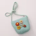 Kids mint green woven straw crossbody bag with 3D fabric flowers and ladybug detail - Lake Blue Bag