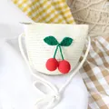 Kids handmade straw crossbody bag with red cherry decoration and white weave texture - Crossbody Bag / Milk White