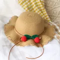 Light brown children's straw hat with crochet cherry decor and wavy edge design - Straw Hat / Khaki