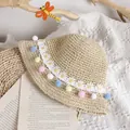 Handmade straw sun hat for girls with colorful pompoms and white daisy lace trim - One Size / Beige Straw Hat