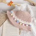 Pink woven straw sun hat for girls with daisy lace and colorful pom pom accents - One Size / Pink Straw Hat