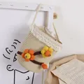 Straw bucket bag for girls with white lace trim and orange floral accents - One Size / Beige