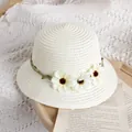 Mini white woven straw bucket bag for kids featuring delicate daisy flower accents - Cream / Straw Hat