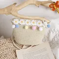 Kids handmade straw crossbody bag with colorful pom-poms and daisy flower trim - One Size / Beige Bag
