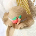 Girl's straw sun hat with wavy brim and strawberry carrot accents in natural beige - Straw Hat / Khaki