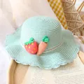 Kids mint green woven straw sun hat with strawberry carrot charms and wavy brim - Straw Hat / Lake Blue