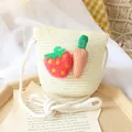 Kids cream woven straw crossbody bag featuring plush strawberry and carrot decorations - Bag / Cream