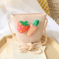Kids woven straw crossbody bag with cute 3D strawberry and carrot plush charms - Bag / Pink
