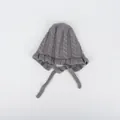 Grey knitted baby bonnet with cable pattern and ruffle trim for winter warmth - One Size / Gray