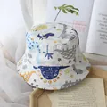 White kids bucket hat featuring colorful cartoon dinosaur prints and tropical patterns - One Size (49-50cm) / Dinosaur