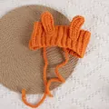 Bright orange hand-knitted baby beanie with bunny ears and ties for infant photography - Orange