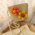 Beige woven straw shoulder bag for girls with orange and yellow fabric floral accents - Hobo Bag / Beige