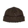 Deep brown knitted beanie with safety pins, metal rings, and distressed edge details - One Size / Dark Green