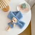 Cute blue plush children scarf featuring a small brown bear doll in a blue dress - Blue