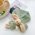 Kids plush neck warmer in pale green featuring a cute cream rabbit doll decoration - Light Green