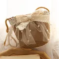 Sweet straw crossbody bag with cream lace bow and pearl accents for summer style - Khaki