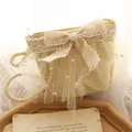 Beige straw shoulder bag with delicate lace bow and white pearl mesh details - Beige