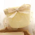 Borsa in paglia gialla per bambina con fiocco in pizzo e perle decorative - Crema