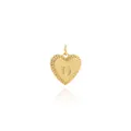 Macro shot of 18K gold plated heart pendant with letter D and sunburst texture - Letter D Style