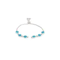 Detail view of 18K gold plated bracelet with six blue crystals and adjustable slider clasp - Lake Blue