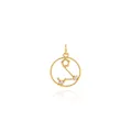 Macro view of 18K gold plated zodiac charm with sparkling cubic zirconia stones - Pisces