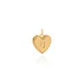 Macro detail of 18K gold plated heart pendant with letter U and radiant texture - Letter U Style