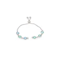 Close-up of adjustable silver bracelet featuring six bezel-set light blue gemstones - Aqua