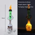 Halloween LED skull candle light featuring skeleton hand and green bat candle design - Large Skull With Hands And Green Lights