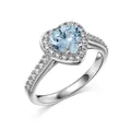 S925 Sterling Silber Ring mit herzförmigem hellblauem Edelstein und Zirkonia-Halo - Größe 5 / Hellblau