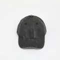 Detail of dark grey washed denim baseball cap showing fabric texture and seams - One Size / Washed Denim Black