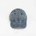 Close-up of washed blue denim baseball cap featuring vintage texture and reinforced stitching - One Size / Dark Washed Blue