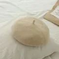 Sweet oatmeal wool beret for baby girls featuring a soft plush texture and round top - Beige